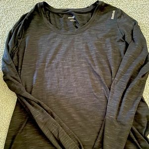 Black Reebok size large womens long sleeve. Wore once. It’s a soft material.